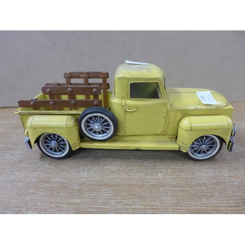 2159 - A tin plate yellow vintage truck