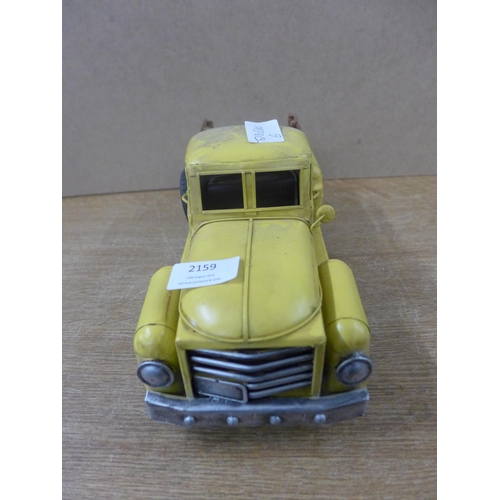 2159 - A tin plate yellow vintage truck