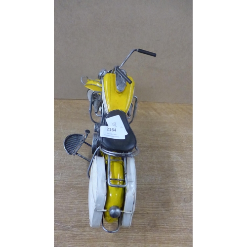 2164 - A tin plate yellow motor bike