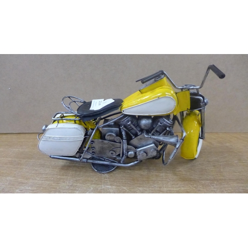 2164 - A tin plate yellow motor bike