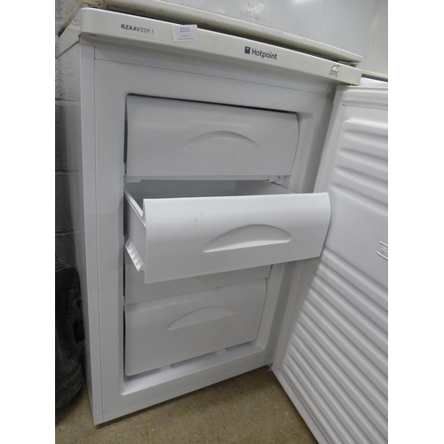 2221 - A Hotpoint under counter freezer (model no. 122AAV23P-1)