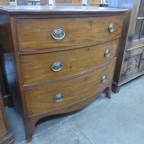 105 - A George III style mahogany bow front chest of drawers