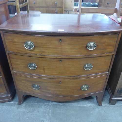 105 - A George III style mahogany bow front chest of drawers