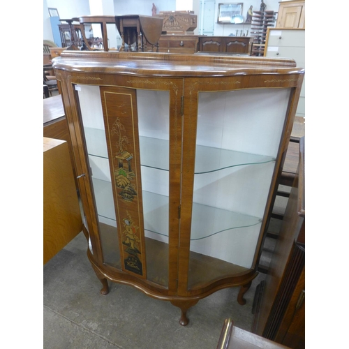 117 - A Japanned walnut display cabinet