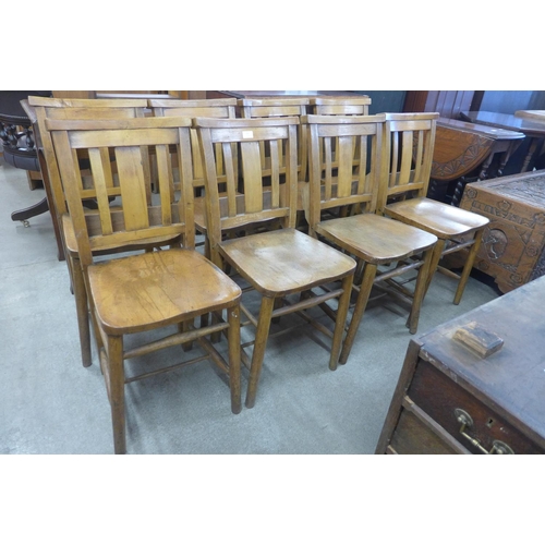 131 - A set of eight early 20th Century beech chapel chairs