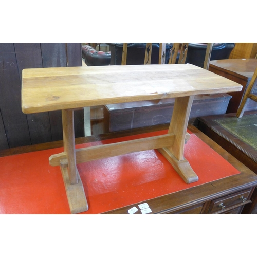 141 - A Cotswold School oak coffee table