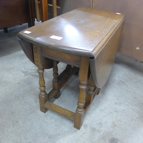 167 - An Old Charm oak gateleg occasional table