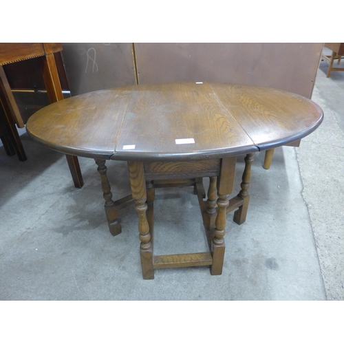 167 - An Old Charm oak gateleg occasional table