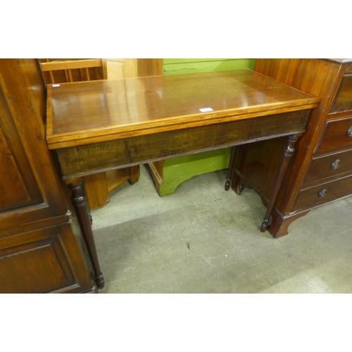 205 - A George IV mahogany rectangular fold over card table