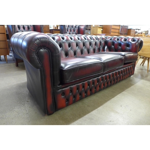 3 - An oxblood red leather Chesterfield settee