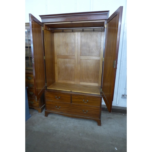 32 - An Edward VII mahogany wardrobe