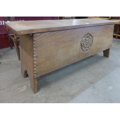 43 - A Jack Grimble of Cromer carved oak blanket box