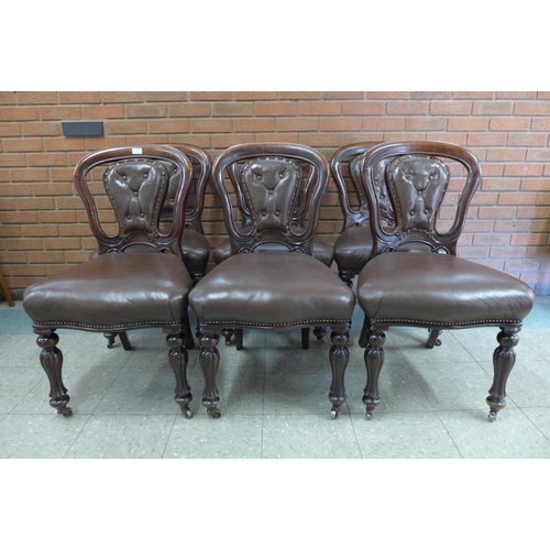 44 - A set of six Victorian mahogany and brown leather dining chairs