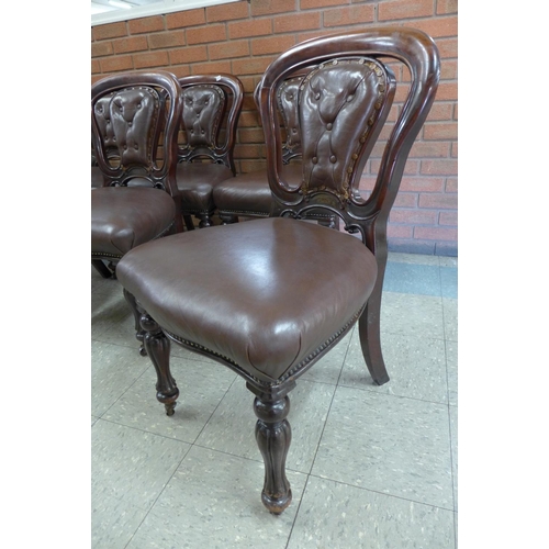 44 - A set of six Victorian mahogany and brown leather dining chairs