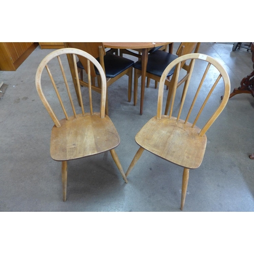 58 - A pair of Ercol Blonde elm and beech Windsor chairs