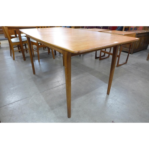 60 - A McIntosh teak T2 model extending dining table