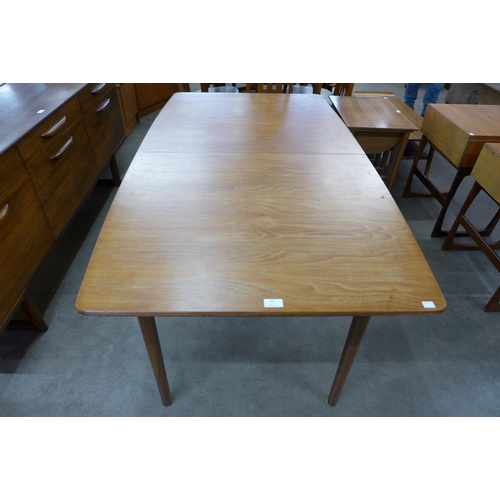 60 - A McIntosh teak T2 model extending dining table