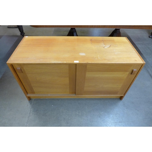 76 - A small Danish Domino Mobler teak sideboard