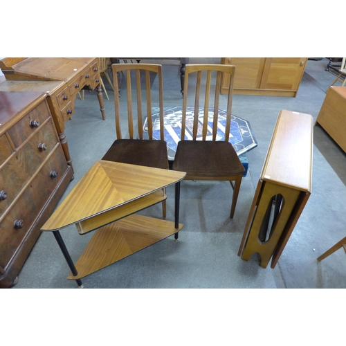 81 - A McIntosh teak drop-leaf table, two G-Plan teak chairs ana a corner table