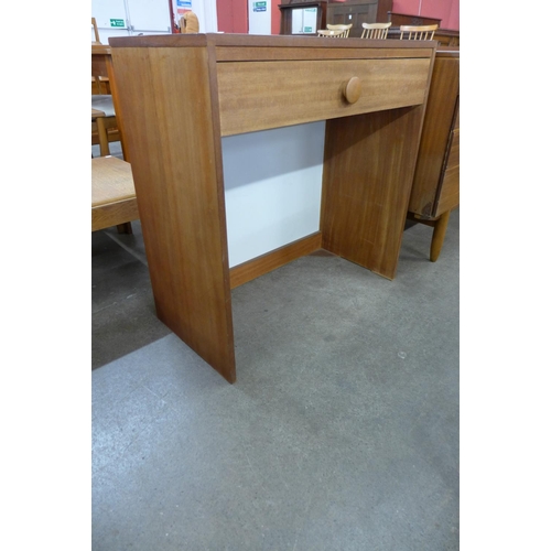 87 - A teak single drawer side table