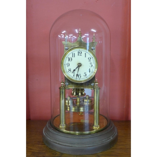 9 - A German Gustav Becker brass torsion clock