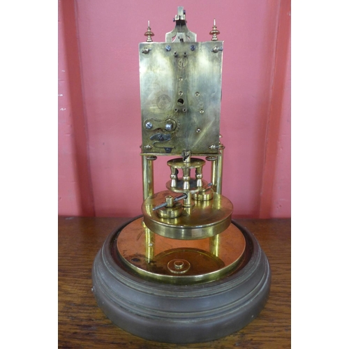 9 - A German Gustav Becker brass torsion clock