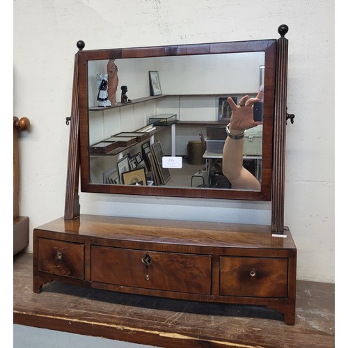 334 - A George IV mahogany toilet mirror