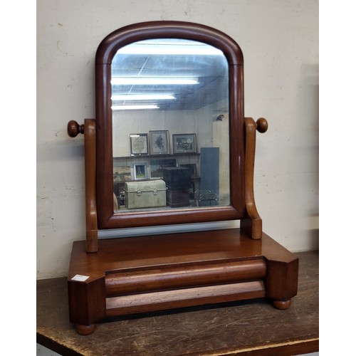 334A - A Victorian mahogany toilet mirror