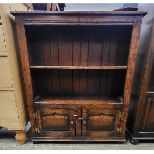 110 - A George III style Ipswich oak open bookcase