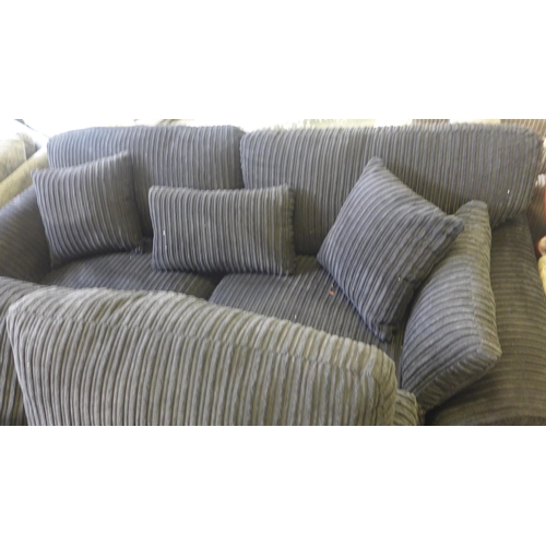 1588 - A pair of black jumbo cord 2 and 3 seater sofas - (PLEASE BE AWARE THIS ITEM HAS A TEAR TO THE BACK ... 