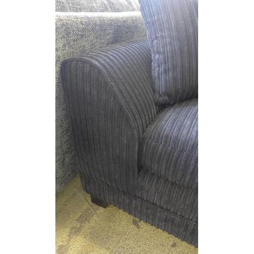 1588 - A pair of black jumbo cord 2 and 3 seater sofas - (PLEASE BE AWARE THIS ITEM HAS A TEAR TO THE BACK ... 