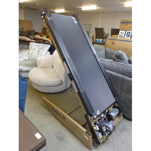 1599 - A Reebok Jet 300+ treadmill - (PLEASE BE AWARE THIS ITEM IS MISSING MAJOR PARTS)  *This lot is subje... 