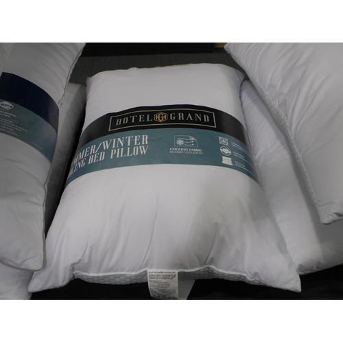 3230 - Two Hotel Grand All Seasons Reversible Rolled Pillows (300-164) *This lot is subject to VAT