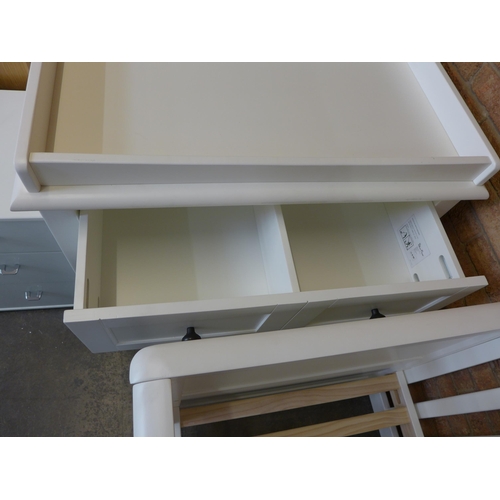 1510 - A Silver Cross white painted cot bed and two over two chest - slight dent * this lot is subject to V... 