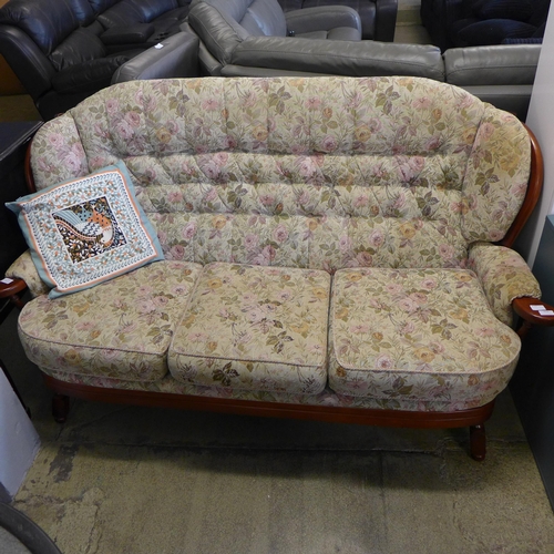 1578 - A dark stained wood and floral upholstered cottage sofa and a black painted cabinet