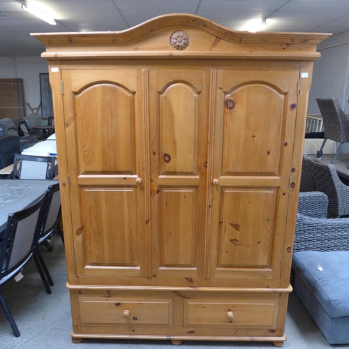 1594 - A pine triple gents wardrobe