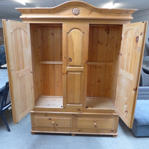 1594 - A pine triple gents wardrobe