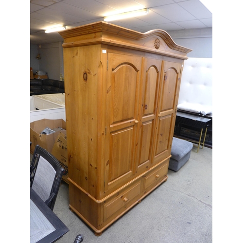 1594 - A pine triple gents wardrobe