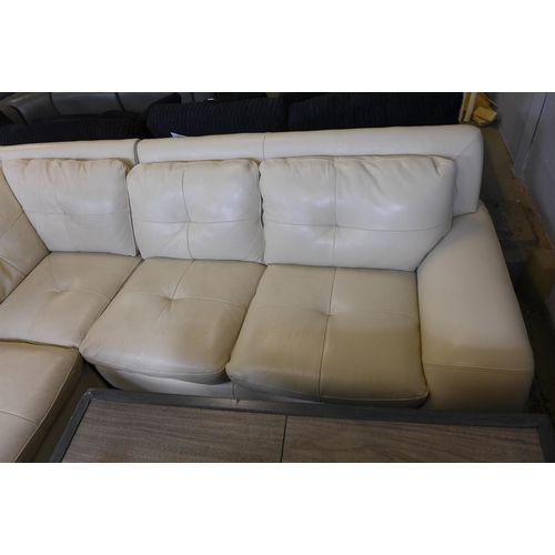 1600 - A cream leather lefthand facing corner sofa