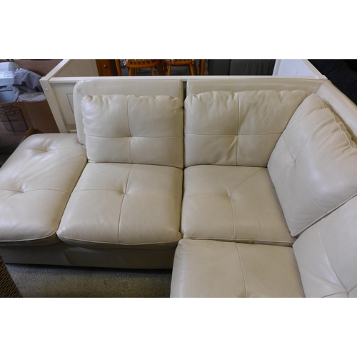 1600 - A cream leather lefthand facing corner sofa