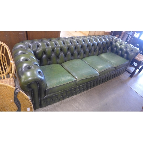 143 - A green leather Chesterfield settee