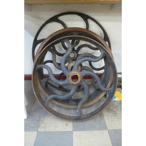 244A - Three large industrial cast iron wheels