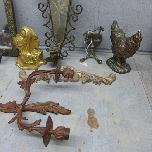 1123 - A collection of decorative items, including a sconce, wall mounts, etc. **PLEASE NOTE THIS LOT IS NO... 