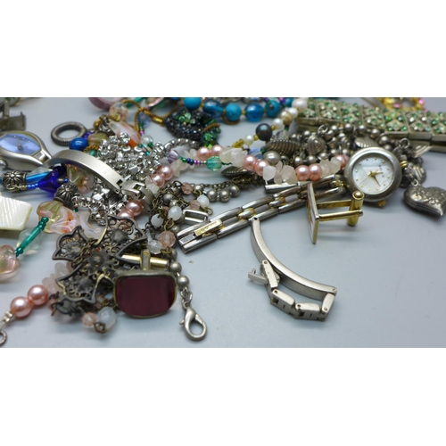 614 - Costume jewellery, lady's wristwatches and eight pairs of cufflinks