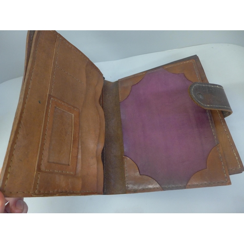 665 - A leather travelling writing folio