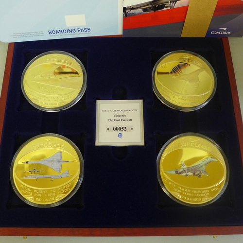 670 - Concorde, a case of four medallions, and a sheet of stamps