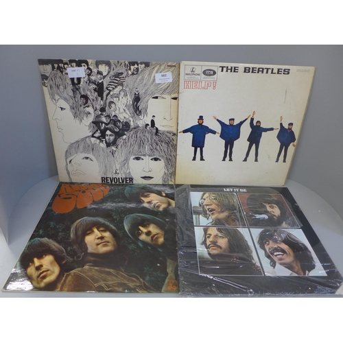 682 - Four Beatles LP records, Rubber Soul, Help, Revolver and Let It Be