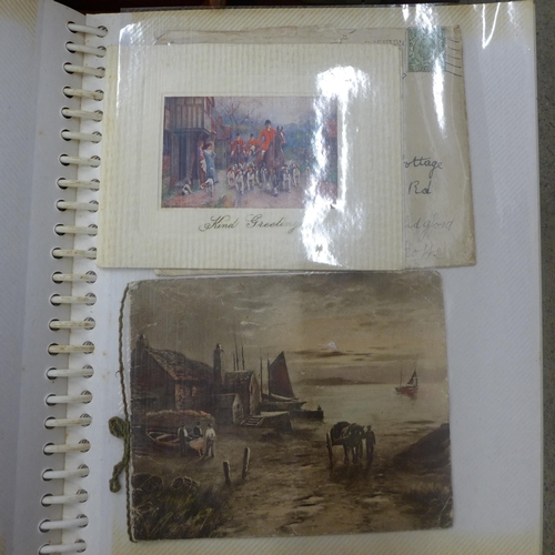 695 - A collection of ephemera, photographs, etc., and an album of early greetings cards