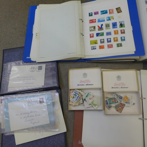 704 - A collection of assorted stamps in albums and loose, British and worldwide