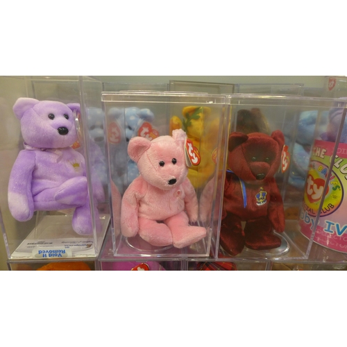 710 - A collection of Ty Beanie Babies in plastic cases